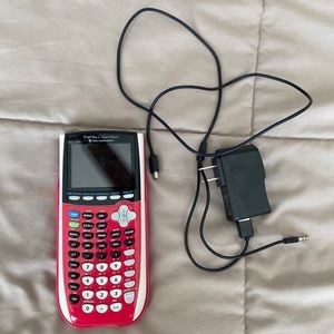 Pink TI-84 Plus C Silver Edition graphing calculator with charger